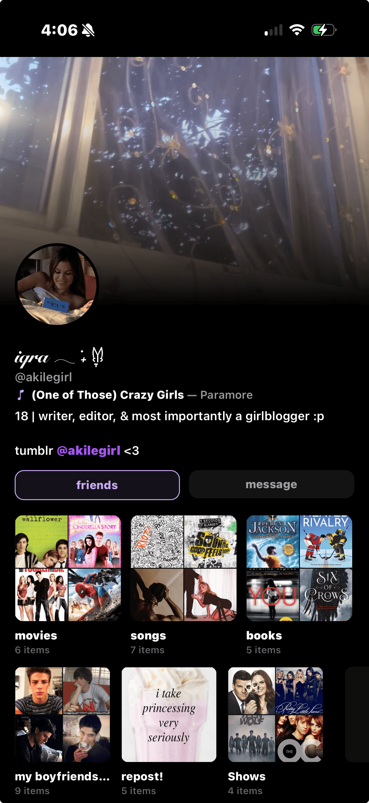 Iqra's Sharespot profile with a window and fairy lights header.